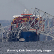 Baltimore bridge collapsed onto a container ship (Photo by Kevin Dietsch/Getty Images)