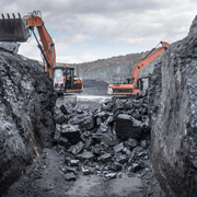 Excavators working at a coal mine.