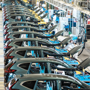 Autos on an assembly line