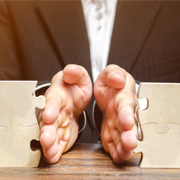 Business person with hands spread open