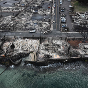 Destroyed homes and buildings burned to the ground near Maui. (Photo by Patrick T. Fallon / AFP)