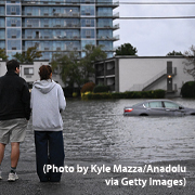 A car sits in a flooded parking lot near the Hudson River in New Jersey after a nor'easter hit in September 2026.