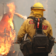 Firefighter with hose (Cal Fire photo)