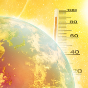 Photo of the Earth next to rising thermometer