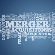 Interconnected mergers and acquisitions words in white on a blue background