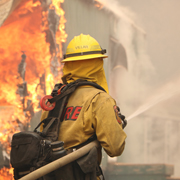 Firefighter battling blaze