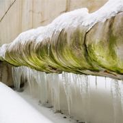Large pipe encased in ice
