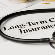 Paper with long-term care insurance written on it