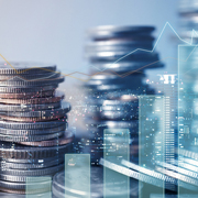 Picture of stacked coins and financial chart