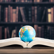 Open book and globe