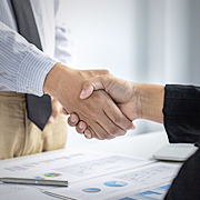Two business people shake hands