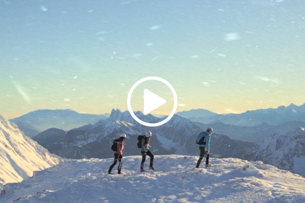 Climbers atop a mountain